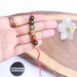 Crystal Rakhi with Buddhist mantra